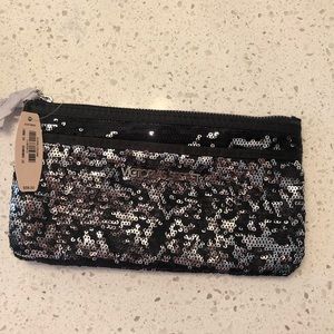 Victoria Secret small glittery clutch/cosmetic bag. Never used.